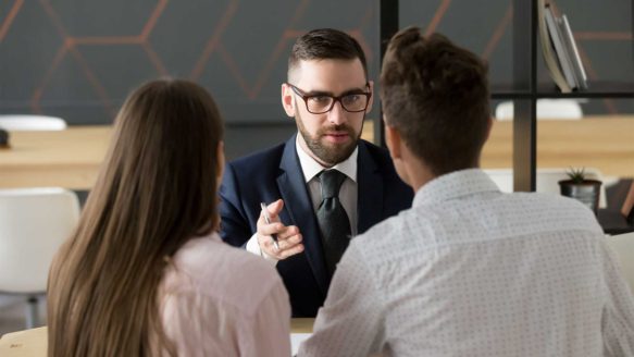 Credit counsellor discusses debt options and resources with young Alberta couple
