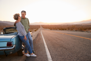 Retired senior couple on a road trip after paying off what they owed with the OPD program.