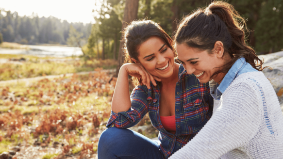 Young couple in autumn discussing past money mistakes.
