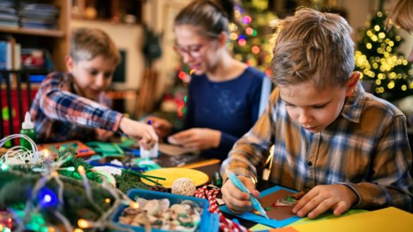 A family use their Money Mentors tips to make crafts and save money at Christmas.